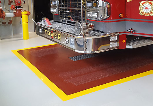 Firefighters are rugged and resilient; they deserve a floor equally as durable. When Plainville erected a new Public Safety Facility, Black Bear Coatings & Concrete was tagged to install floors in the fire department apparatus bays, police department sally ports and jail cells. Pictured is a urethane flooring system with three colors that will withstand the test of time.